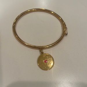 Kate Spade gold bracelet with 🩷 charm “let’s go steady.”